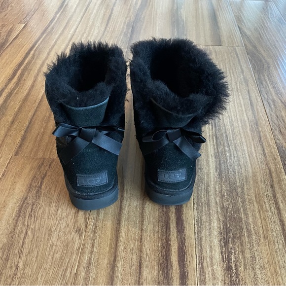 Ugg’s mini Bailey bow ll boots. Black size 7, lightly used. - Picture 2 of 4